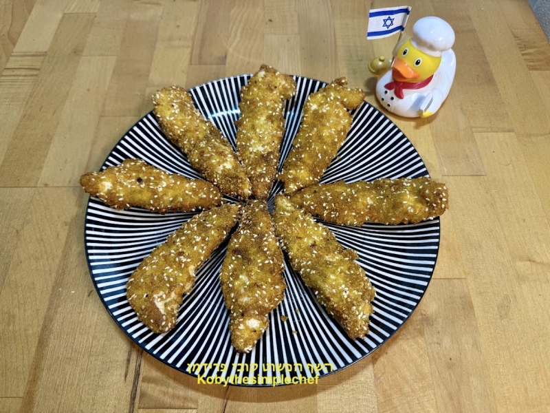 שניצלים מפילה עוף בציפוי פירורי קורנפלקס מתובלים ללא גלוטן כשר לפסח